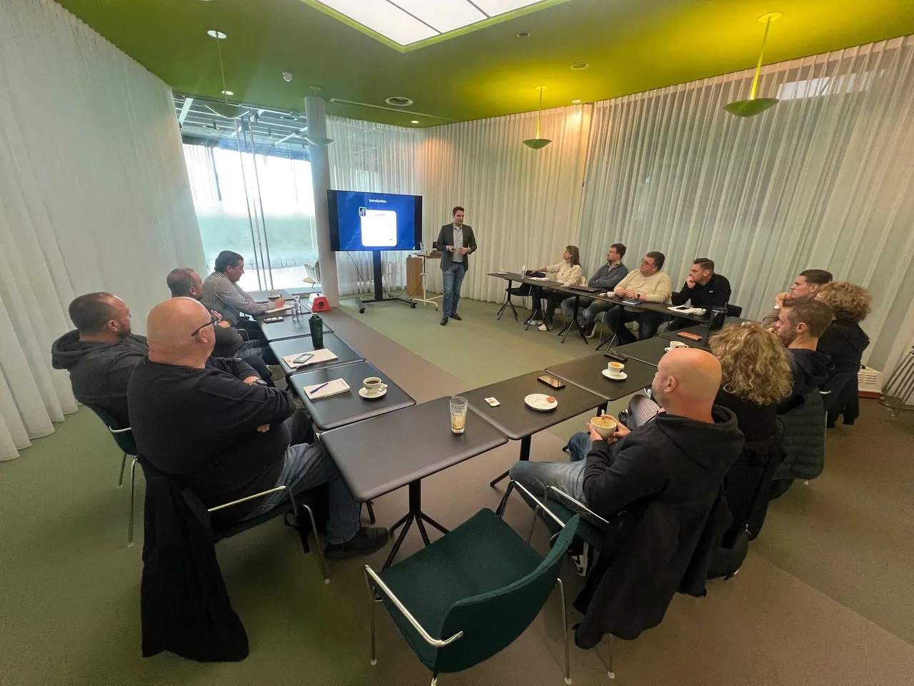 Corporate training session showing hands-on document verification